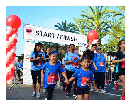 children and adults running in race