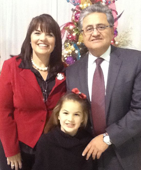 A portrait of Mardee and Jaime Jessop with Dr. Semnani